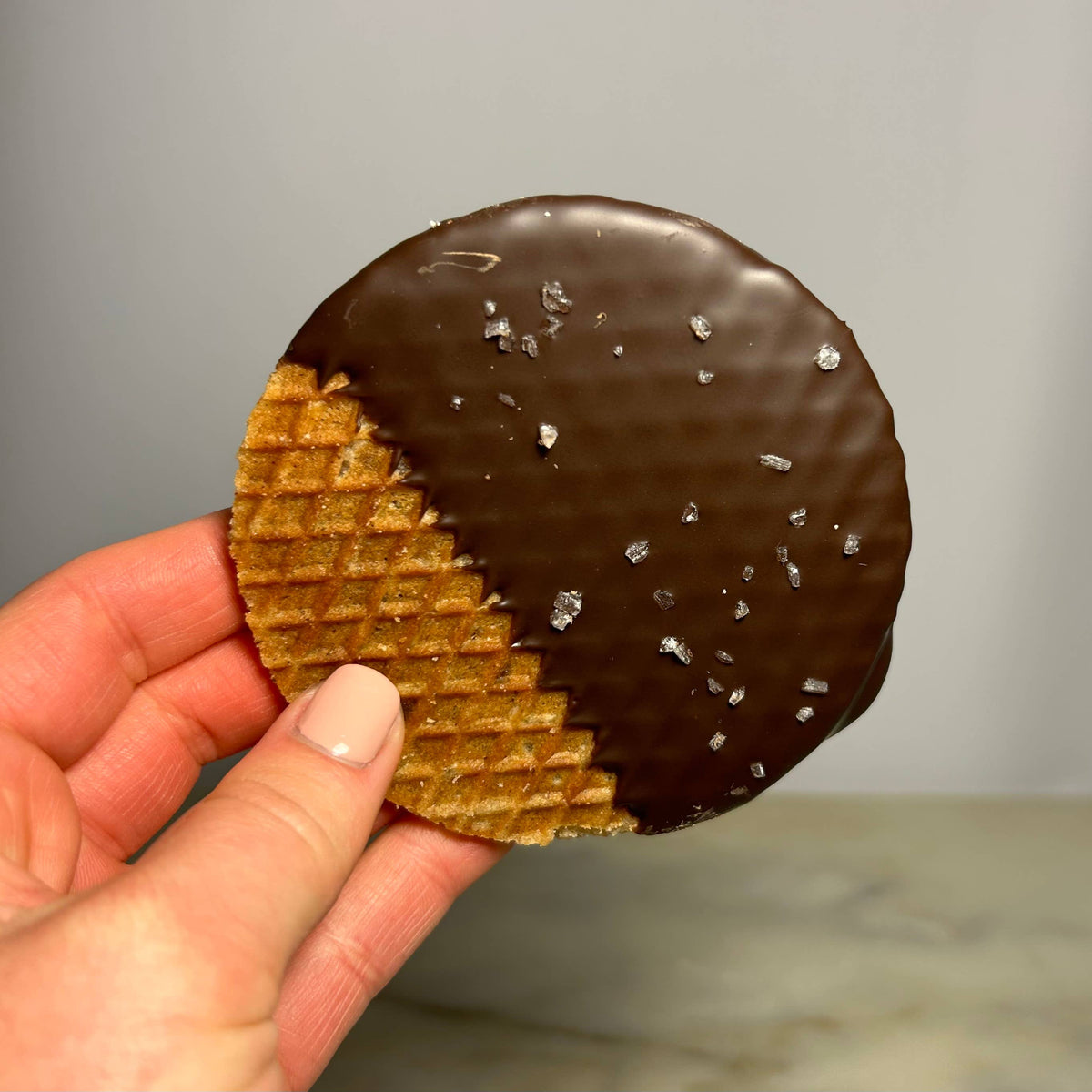 Handmade Stroopwafel half-dipped in rich chocolate with sprinkled sea salt, artisan gift treat. - Stroopwafel (Single): Salted Caramel