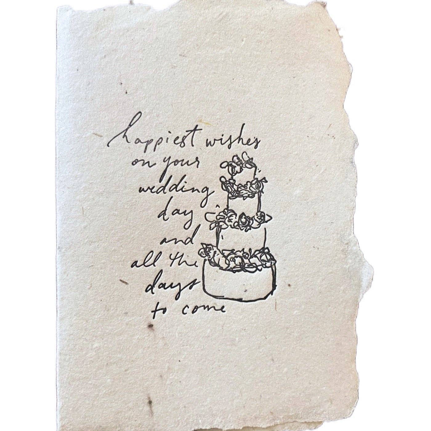 Handmade wedding card with delicate ink sketch cake and handwritten "Happiest wishes" message on textured paper. - Happiest wishes wedding cake card