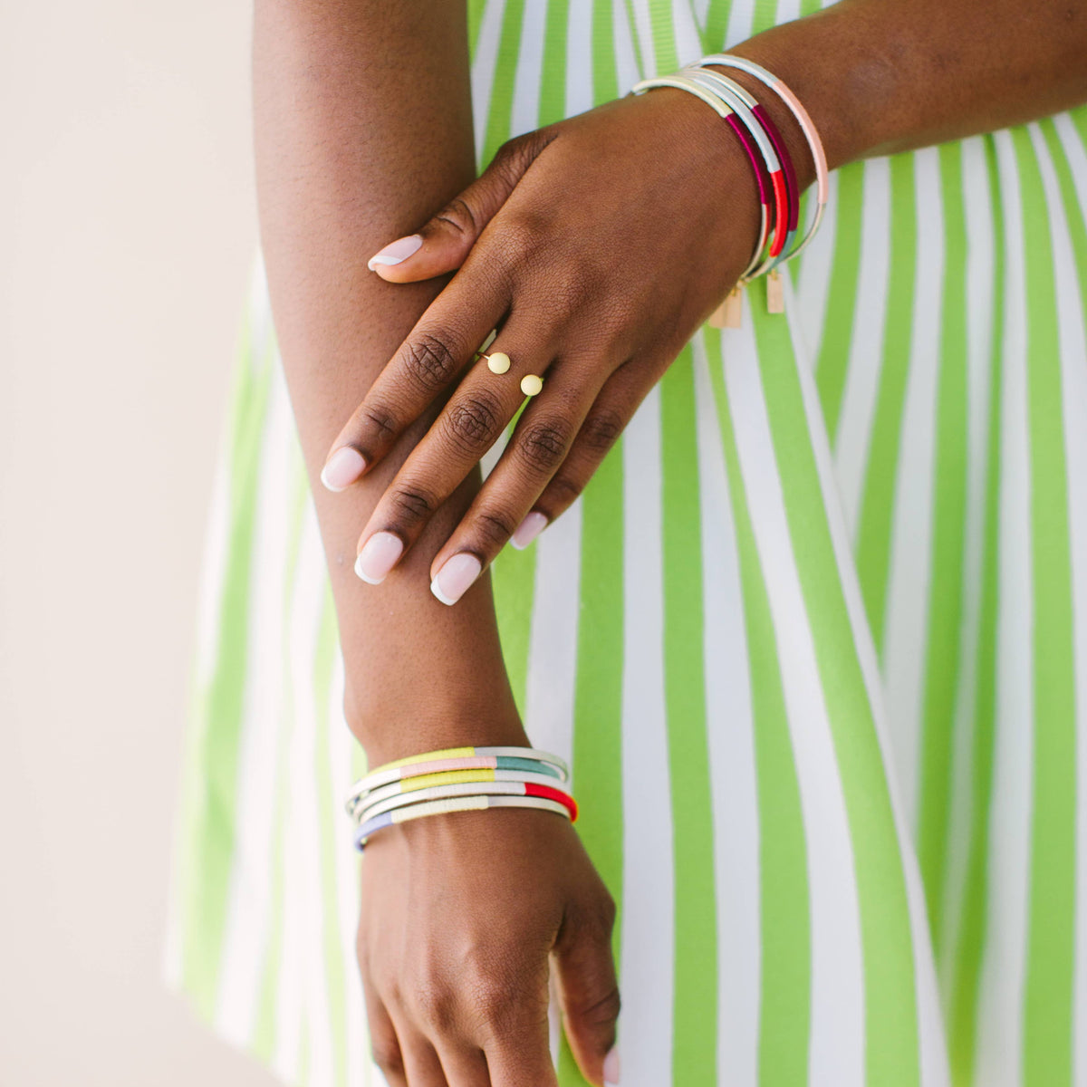silver bangles in pastel colors