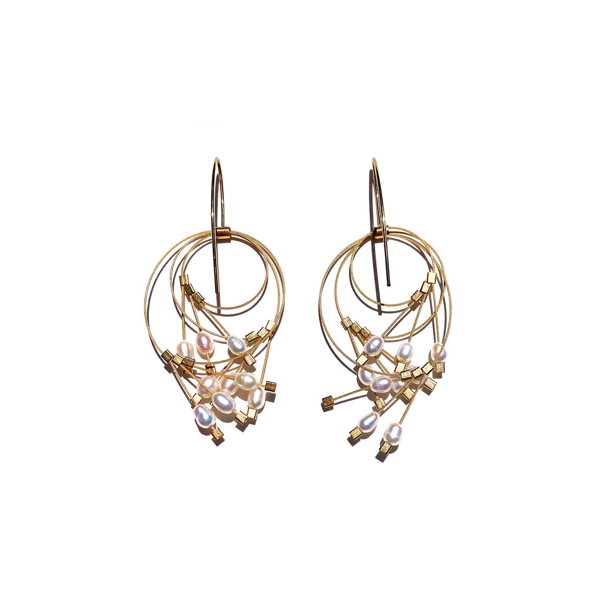 Vertigo Hook Earrings: White Pearl on Gold Cable with Gold Hardware