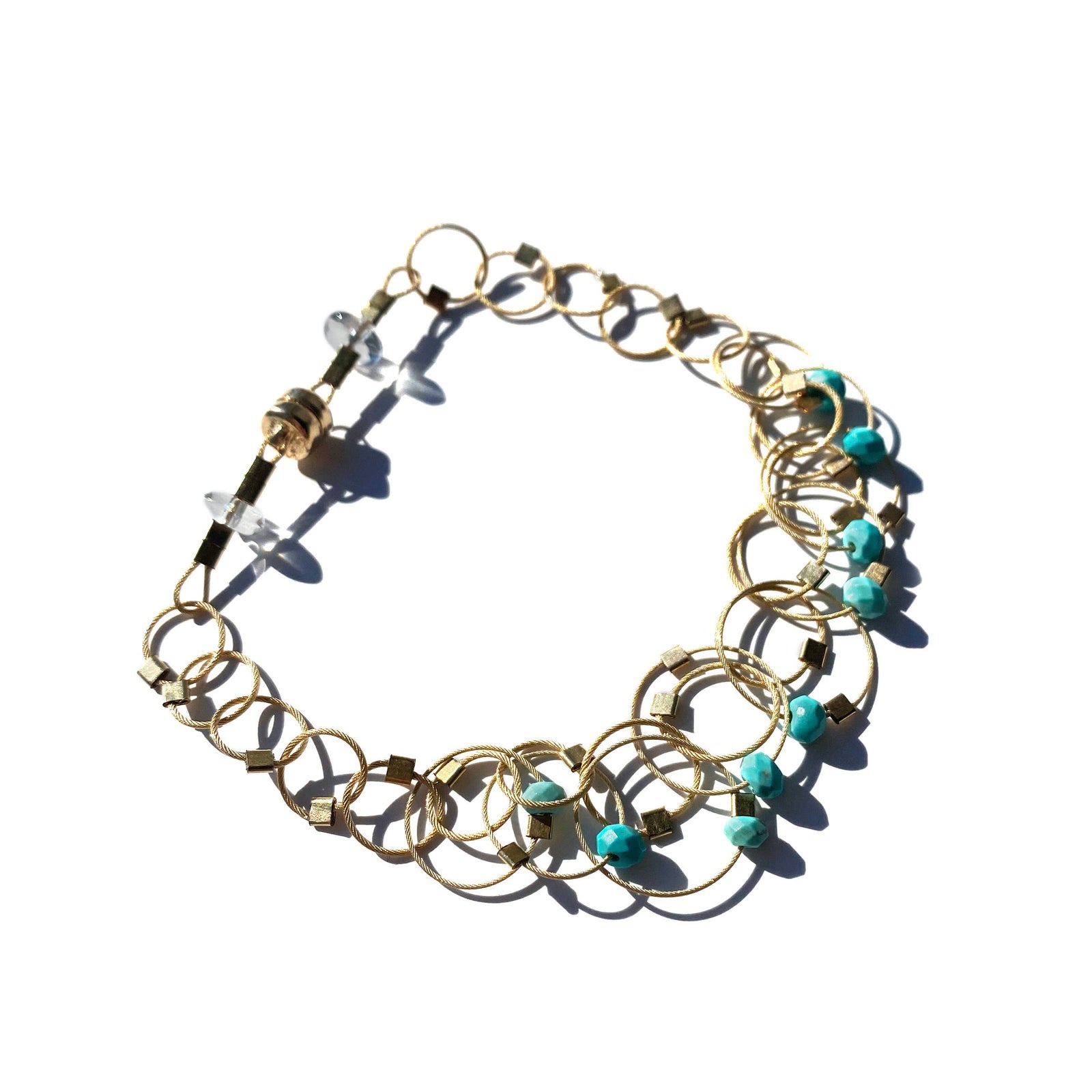 Handmade turquoise vertigo bracelet with gold cable links, unique artisan gift design. - Turquoise Vertigo Bracelet on Gold Cable