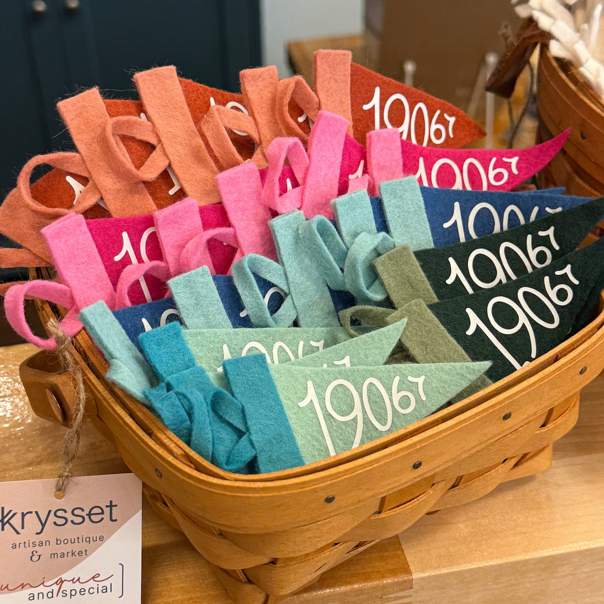 Colorful mini pennant flags with 19067 yardley pa zip code displayed in a wooden basket