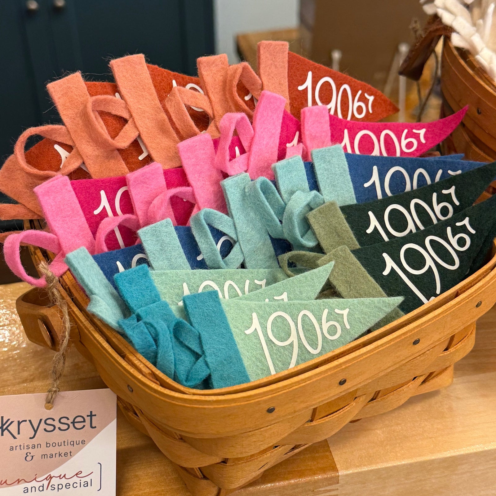 Colorful mini pennant flags with 19067 yardley pa zip code displayed in a wooden basket