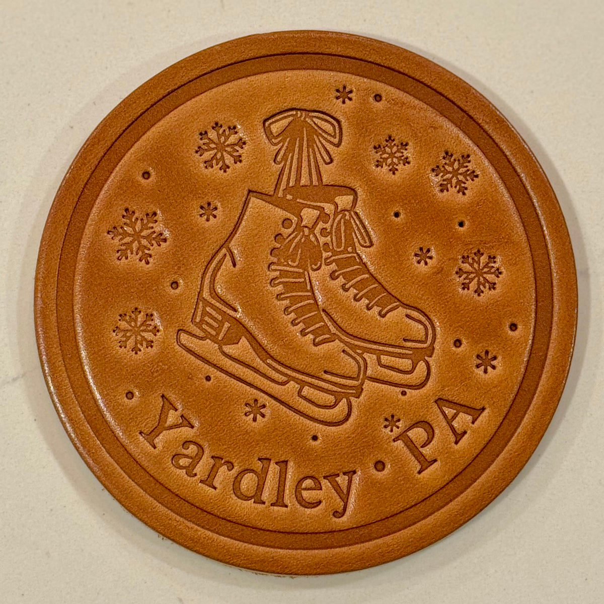 Yardley Ice Skates and Snowflakes Coaster