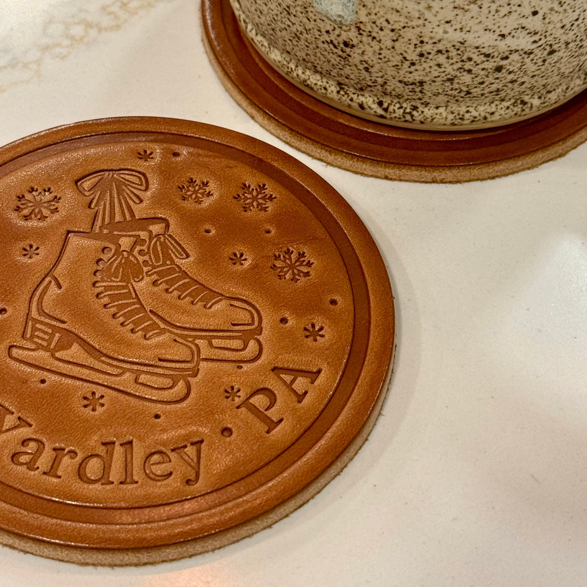 Yardley Ice Skates and Snowflakes Coaster