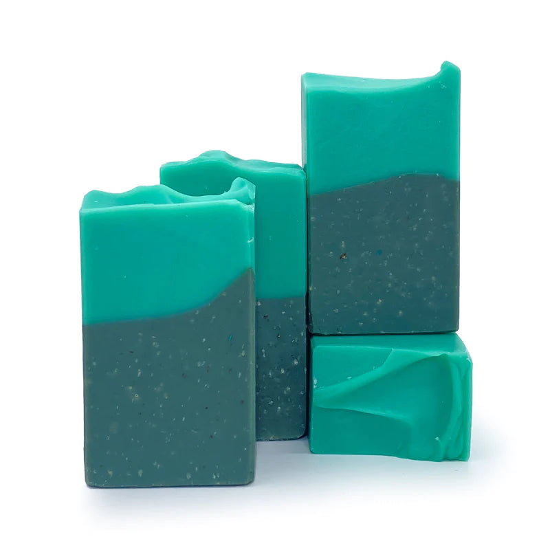 Handmade artisan soap bars in unique blue and teal hues with textured swirls, perfect gift for bath lovers. - Seven Seas Bar Soap