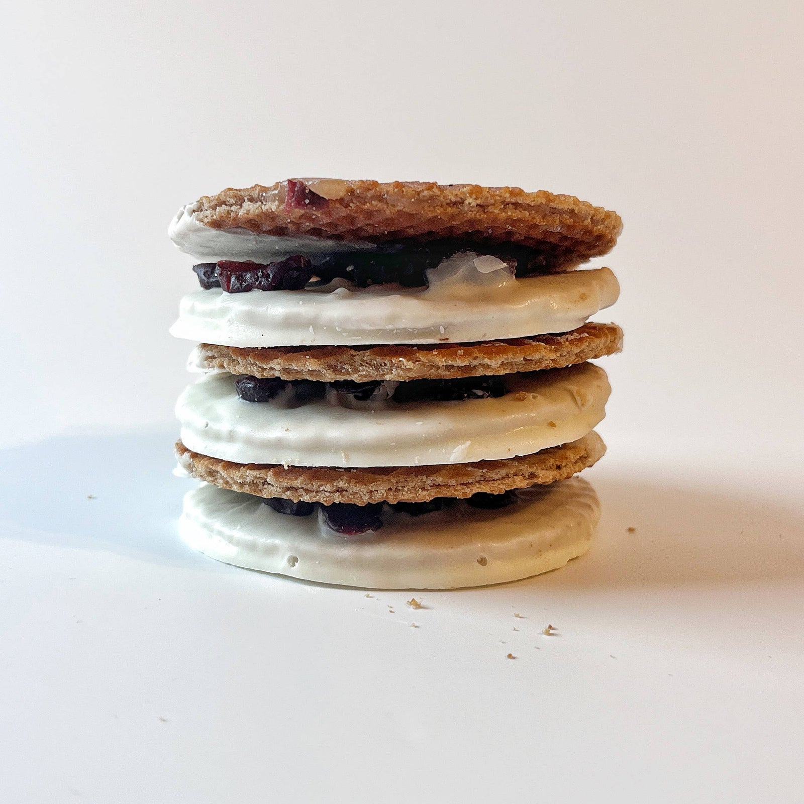 Stack of cookie sandwiches on a white background
